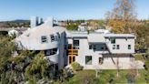 These Homes By Big-Name Architects Just Hit The Market—With Curved Walls And Built-In Furniture (Photos)