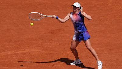 Djokovic withdrawal shakes up French Open as Swiatek roars into semis