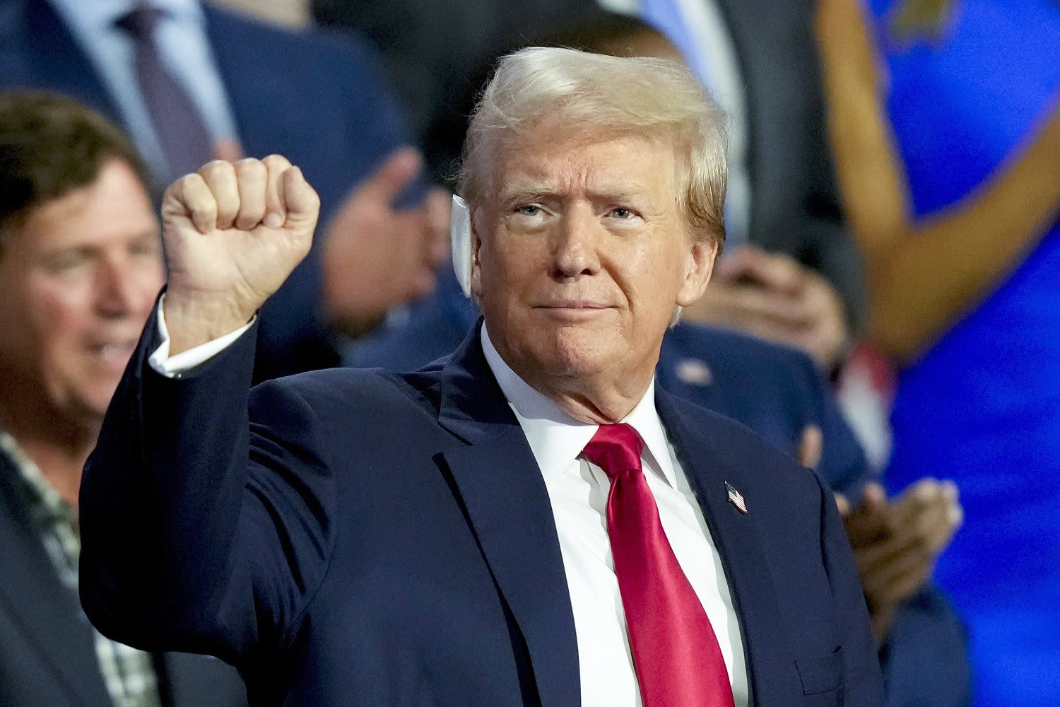 Trump soaks up cheers at GOP convention in first public appearance since shooting