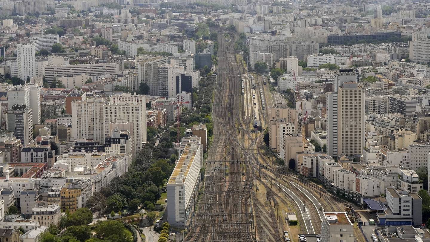 Paris Olympics off to rough start, with sabotaged trains and weather dampening mood before opening