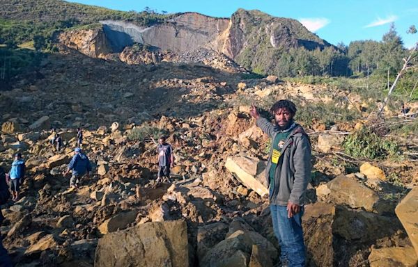 Papua New Guinea says 2,000 people buried alive in landslide as hope fades for survivors