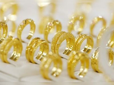 Gold, silver prices decline in India but surge in global markets: Is now the time to buy? - CNBC TV18