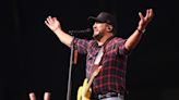 Luke Bryan slipping on fan's cell phone while on stage goes viral