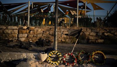 Israel weighs response to Hezbollah after a rocket from Lebanon kills 12 youths on a soccer field