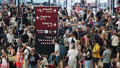 Airports fill with long lines and broken blue screens following cancellations and delays due to global IT outage