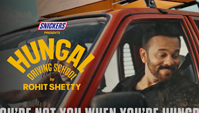Rohit Shetty takes the wheel as brand ambassador for Snickers - ET BrandEquity