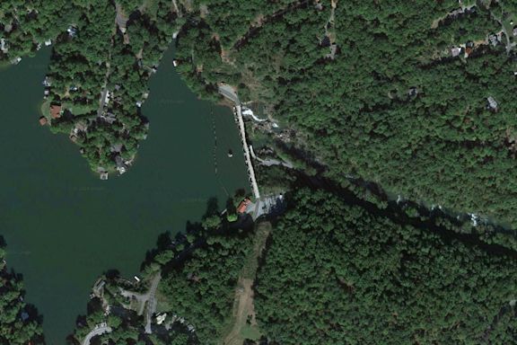 Water overtops North Carolina dam, forcing evacuations after heavy rain