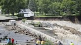 Swollen river claims house next to Minnesota dam as flooding and extreme weather grips the Midwest