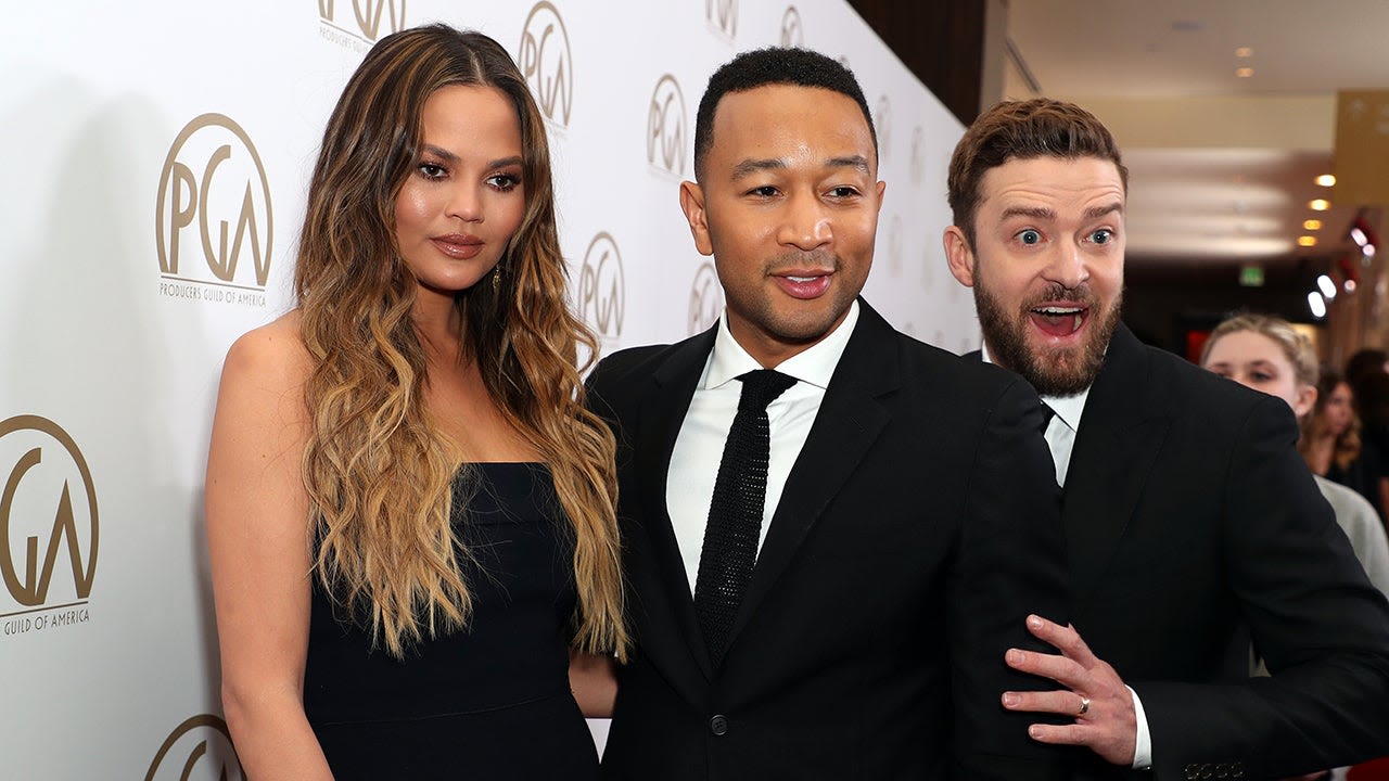 Justin Timberlake Hugs John Legend as He and Chrissy Teigen Attend His NYC Concert