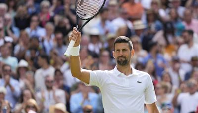 Wimbledon 2024: Novak Djokovic survives spirited challenge from British wildcard Jacob Fearnley