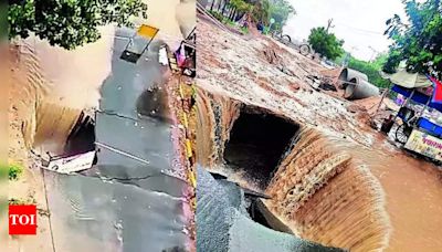 Watch: Road caves-in on outskirts of Ahmedabad after heavy rainfall | Ahmedabad News - Times of India