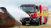 William mans pumps after leaping on fire engine in drill at his old RAF base