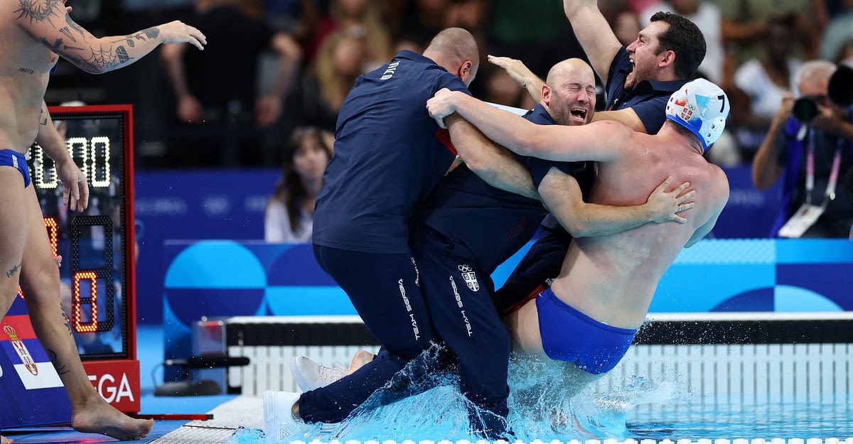 Team Serbia Celebrates Its Gold Medal in Water Polo