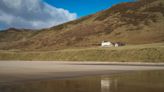 Inside the beautiful holiday cottage sat alone on Wales' world famous bay that blew Alex Jones away