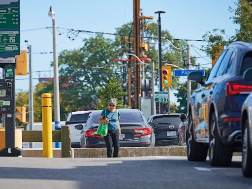 In space-crunched Toronto, debate deepens over what’s more important: parking or affordable housing