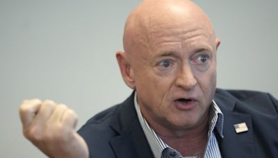 Sen. Mark Kelly finally begins to define himself — as Biden's reelection shill