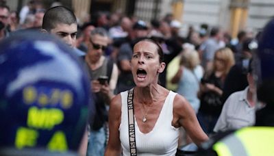 Over 100 arrests in London after flares thrown at Downing Street gates as unrest breaks out across UK over Southport attack