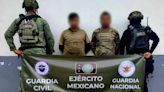 Caen dos colombianos con un fusil Barrett, escopetas y cientos de cartuchos en Michoacán