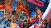 Superstar singer Taylor Swift (R) joined the Victoria's Secret fashion show runway extravaganza in 2013