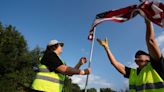 Volunteers line 7 miles of Main Street with flags to honor fallen Belleville Marine