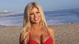 Baywatch’s Donna D'Errico Trolls The Trolls In Gold Bikini: ‘Here’s Me Laying Out In My Yard For Privacy Then...