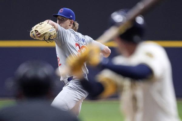 Cubs score five in ninth to beat Brewers