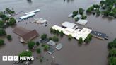 A million people are under flood warnings as heavy rains lash the upper Midwest