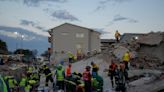 South Africa ends rescue efforts at collapsed building and revises figures: 33 dead, no more missing