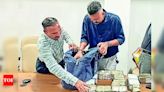 Two persons arrested with 2.14 crore in cash | Rajkot News - Times of India