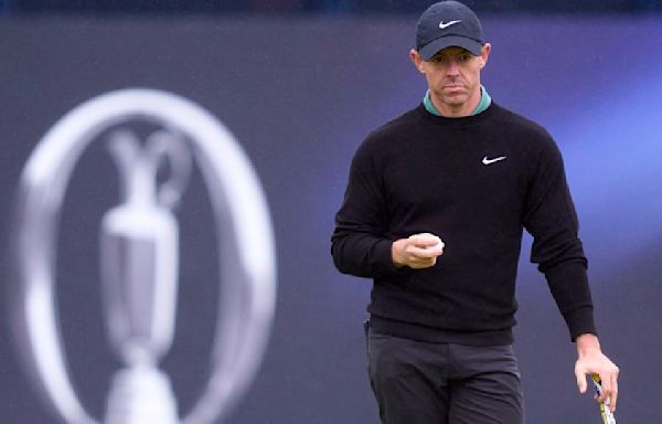 Open Championship: Rory McIlroy loses ball to train tracks as he and Bryson DeChambeau are derailed by grueling starts