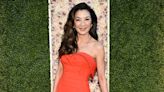 Michelle Yeoh Wore a Bold Orange Gown to the Golden Globes