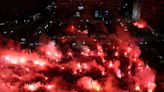 Passionate Olympiakos fans celebrate historic victory