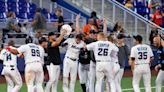 Bruised yet resilient, Marlins rally for another extra-inning win over Pirates