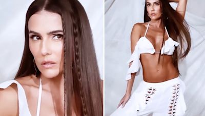 Em vídeo, Deborah Secco combina top e calça com recortes e fãs elogiam: 'Perfeita'