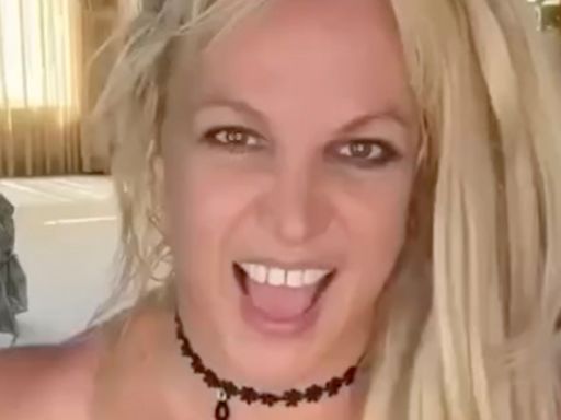 Britney Spears says it's 'good to be alive' as she rides horse in tiny bikini