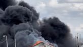 ‘Devastating’ fire destroys county fair barn, dozens of boats inside