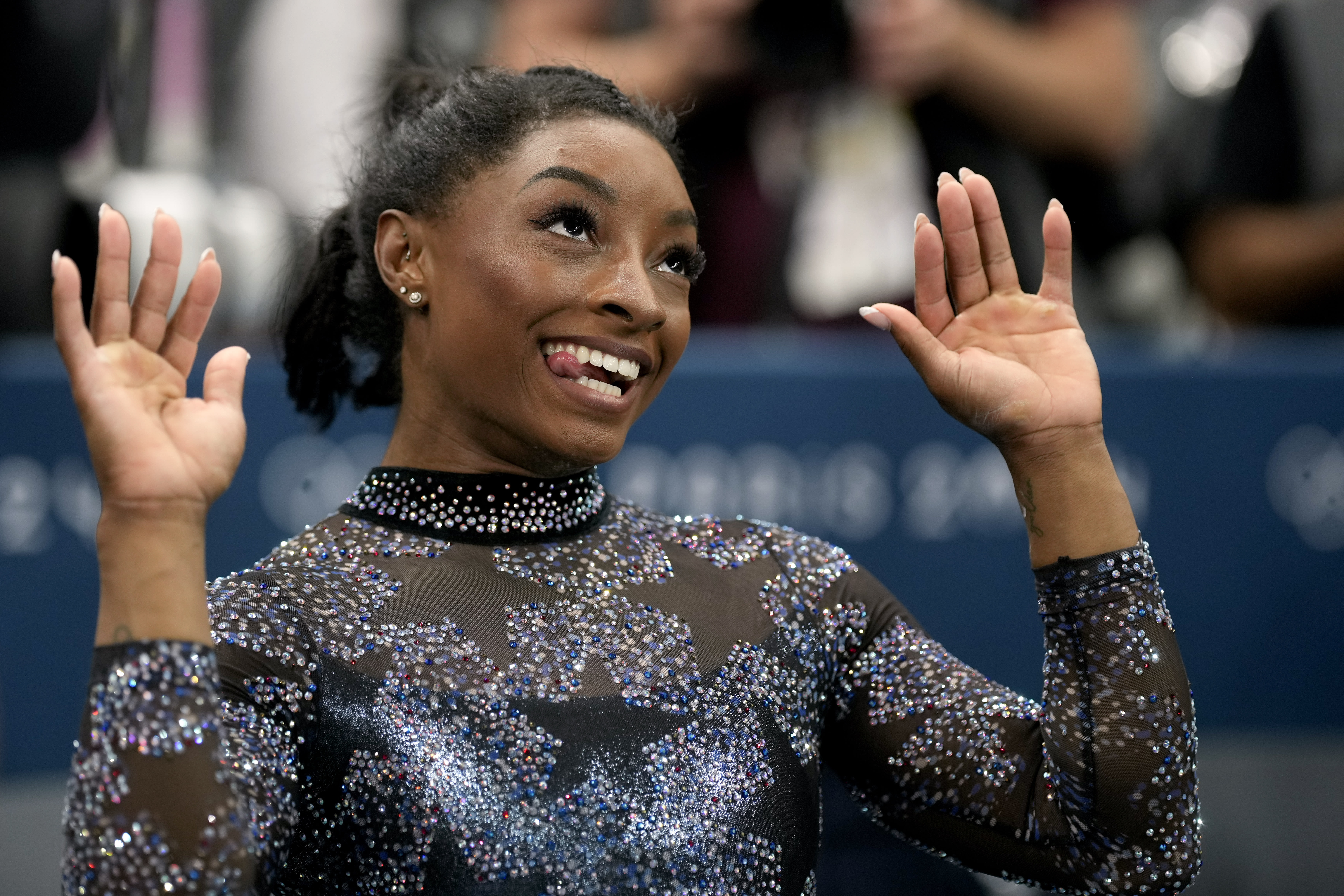 Biles and Team USA mix glamour and grit to surge to the lead at Olympic gymnastics qualifying