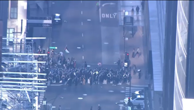 At least 50 people arrested after protests disrupt traffic in downtown Chicago, near O'Hare Airport