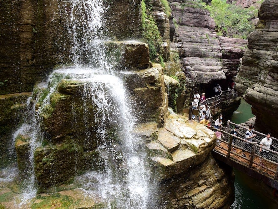 A beloved 1,000-foot waterfall in China is actually fed by water pipes, officials admit