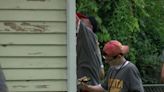 Wichita Workcamp helps those in need by scraping and repainting homes