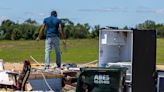 Photos: Neighborhood working to rebuild after Arbor Day tornado