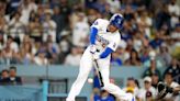 Freeman singles in the go-ahead runs in 8th and Smith homers 3 times as Dodgers beat Brewers 8-5