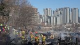 Fire burns makeshift homes in shadow of Seoul's skyscrapers