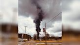 Fire from ruptured gas line creates black plume