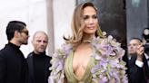 JLo swerves fur coat trend for florals repping two corsage coats in 48 hours