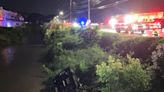 Driver rescued after car plunges into creek in front of Brookwood Village