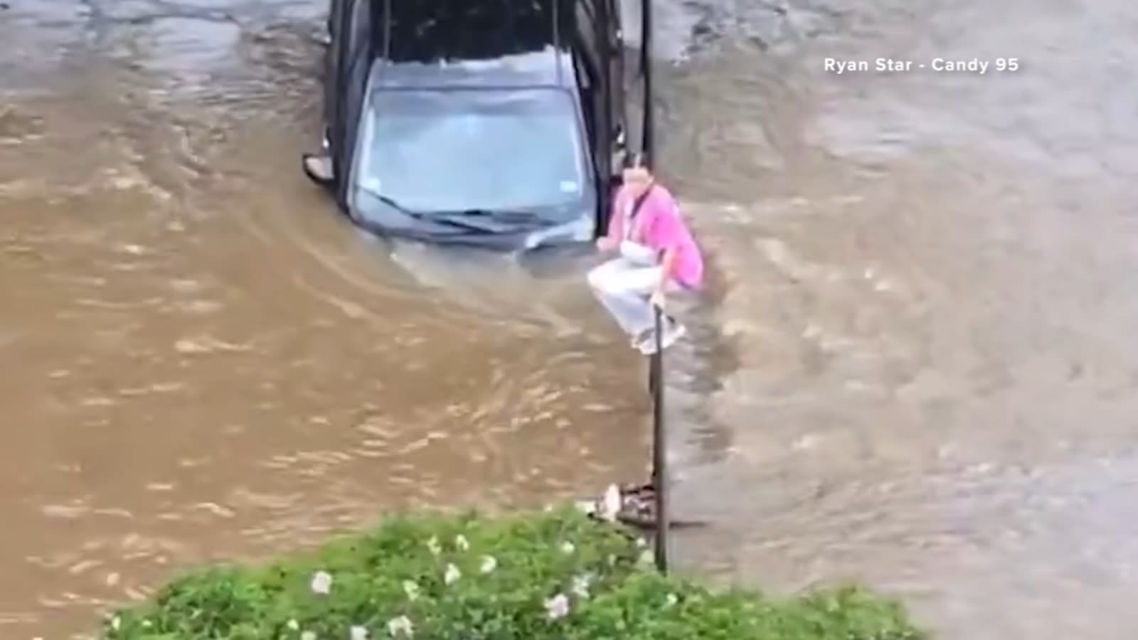 Stranded woman rescued after driving through floodwater in College Station, video shows