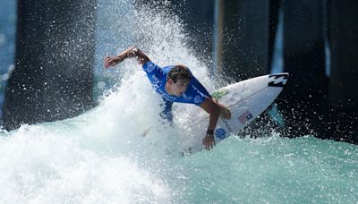 Paris Games could include the sight of helmet-wearing surfers on huge waves in Tahiti