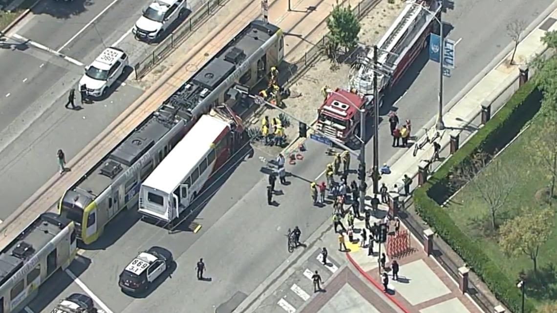 Metro train collides with bus in downtown Los Angeles, injuring more than 50, 2 seriously