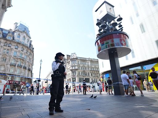 Leicester Square stabbing: Girl, 11, and woman, 34, knifed in centre of London's West End